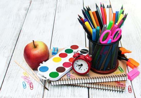 School office supplies on a wooden table